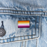 An image of a Lesbian pin on a denim jacket pocket